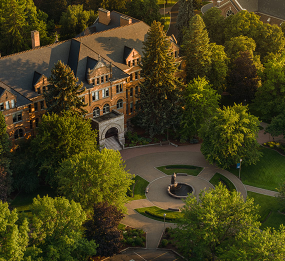 An aerial photo of College Hall and St. Alyoysius Church.